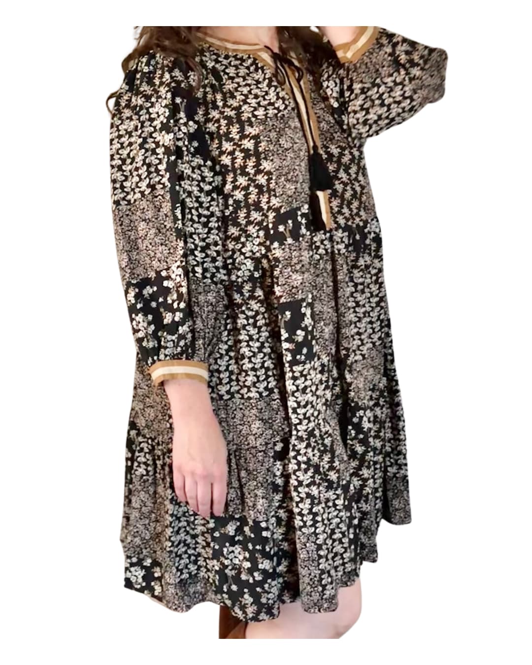 Ditsy Floral Printed Dress with 3/4 sleeves, flowy silhouette, and side pockets in black floral pattern. Ideal for fall fashion and boot pairing.